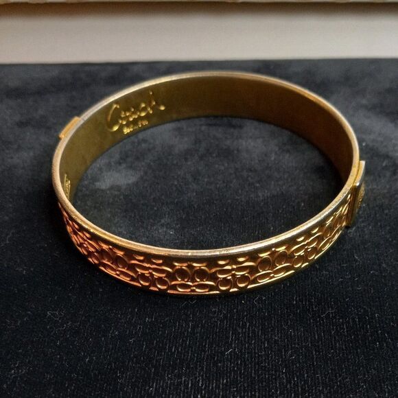 Coach Signature gold tone metal bracelet - Picture 1 of 5